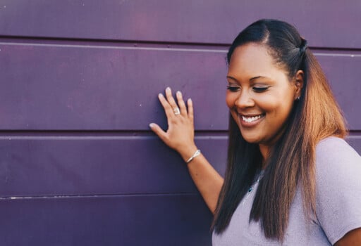 A woman smiling.