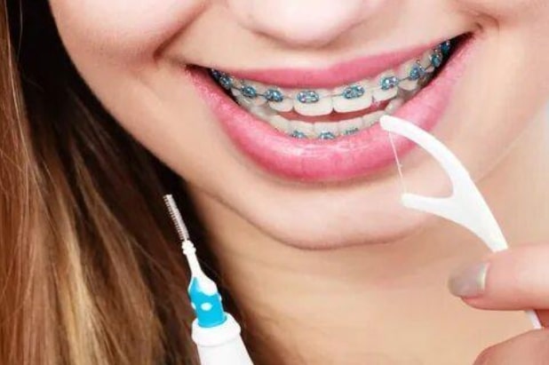 girl flossing